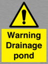 warning-drainage-pond~
